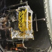 The vacuum chamber door closes