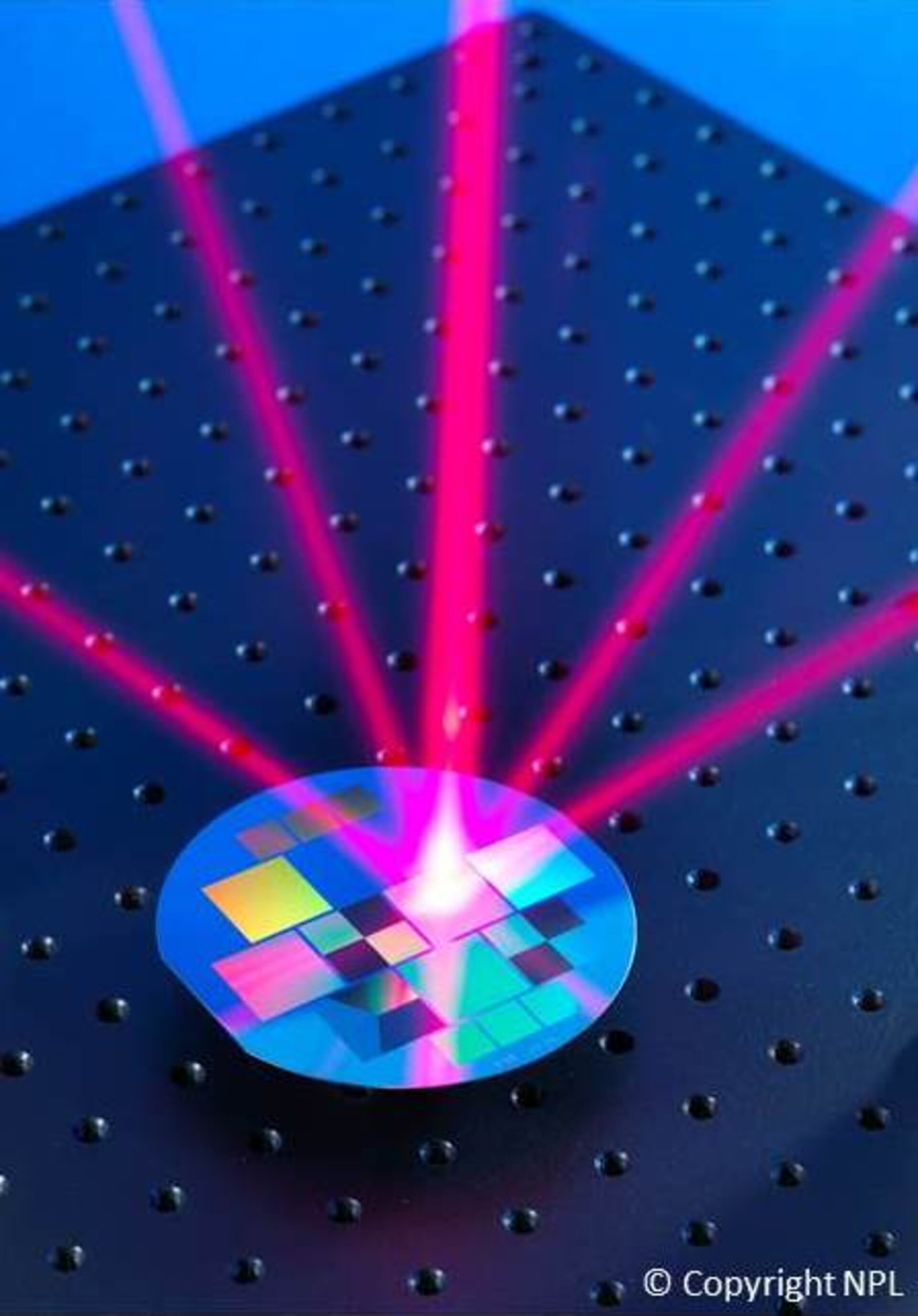 Laser beam shone on reflective wafer grating to trap atoms