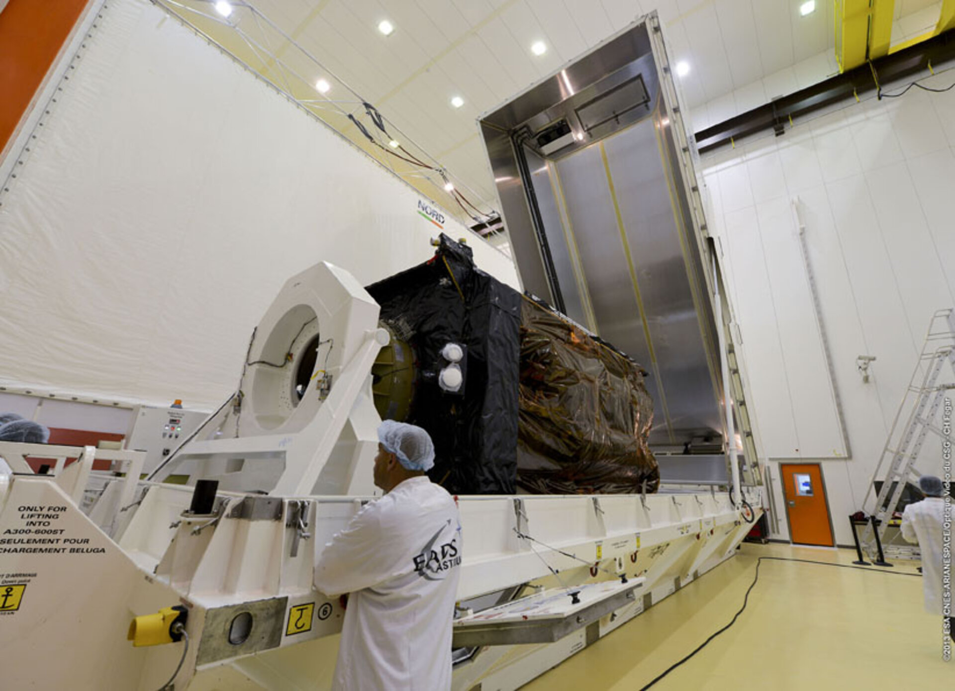 Alphasat being removed from container