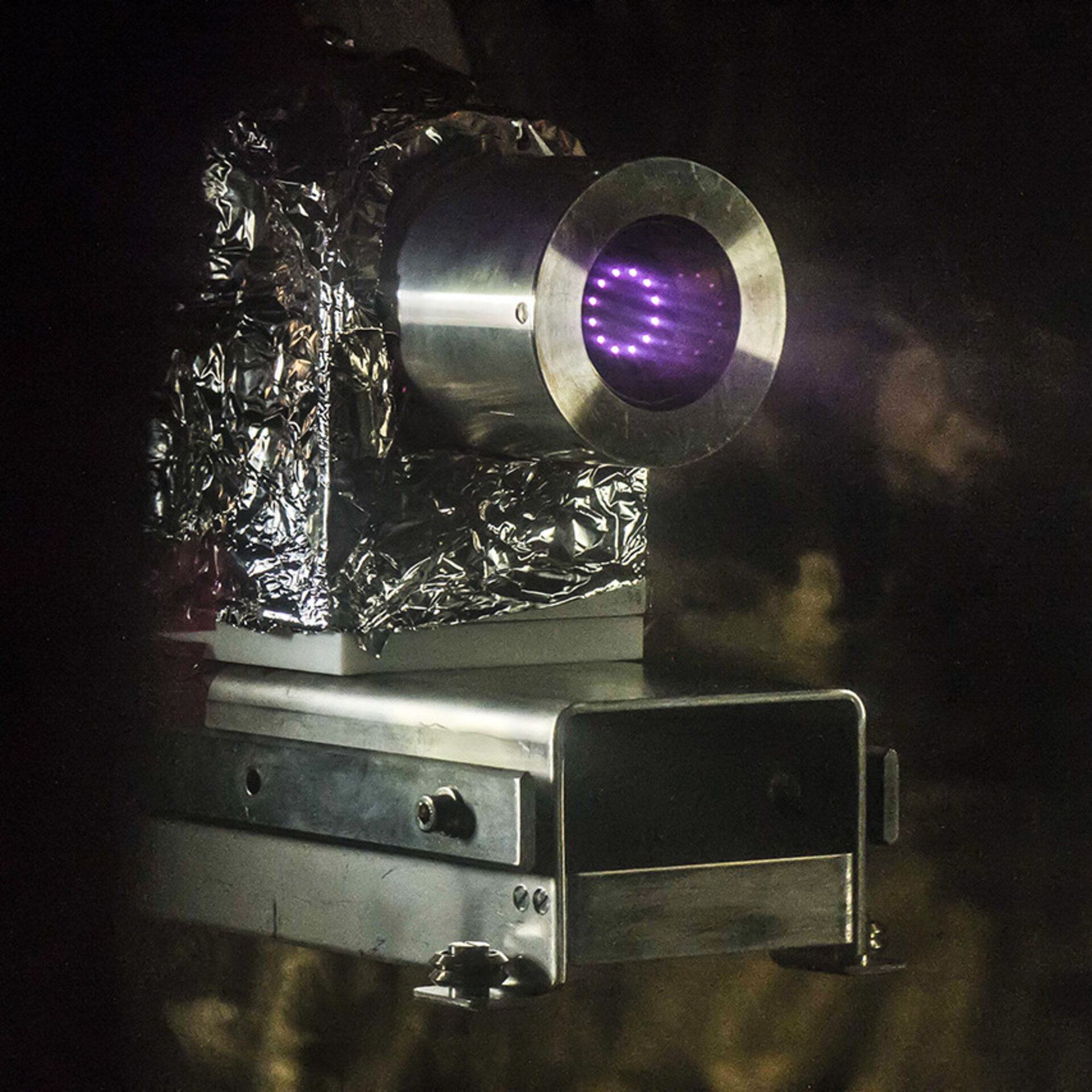 MiniRIT thruster being tested