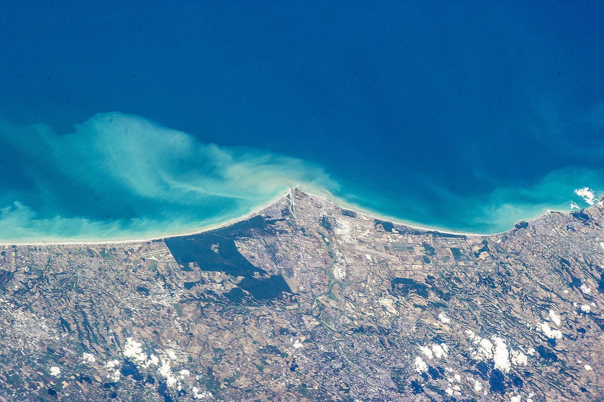 On the coast South of Rome, sand is swept away by the current