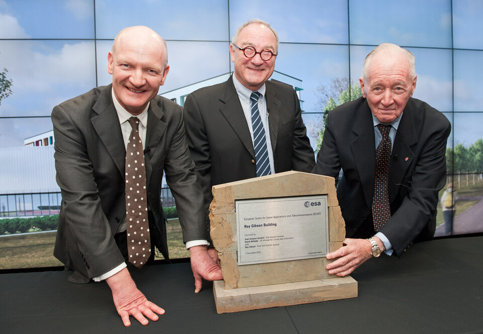 Minister David Willetts, Mr Dordain and Roy Gibson celebrate the naming of ECSAT