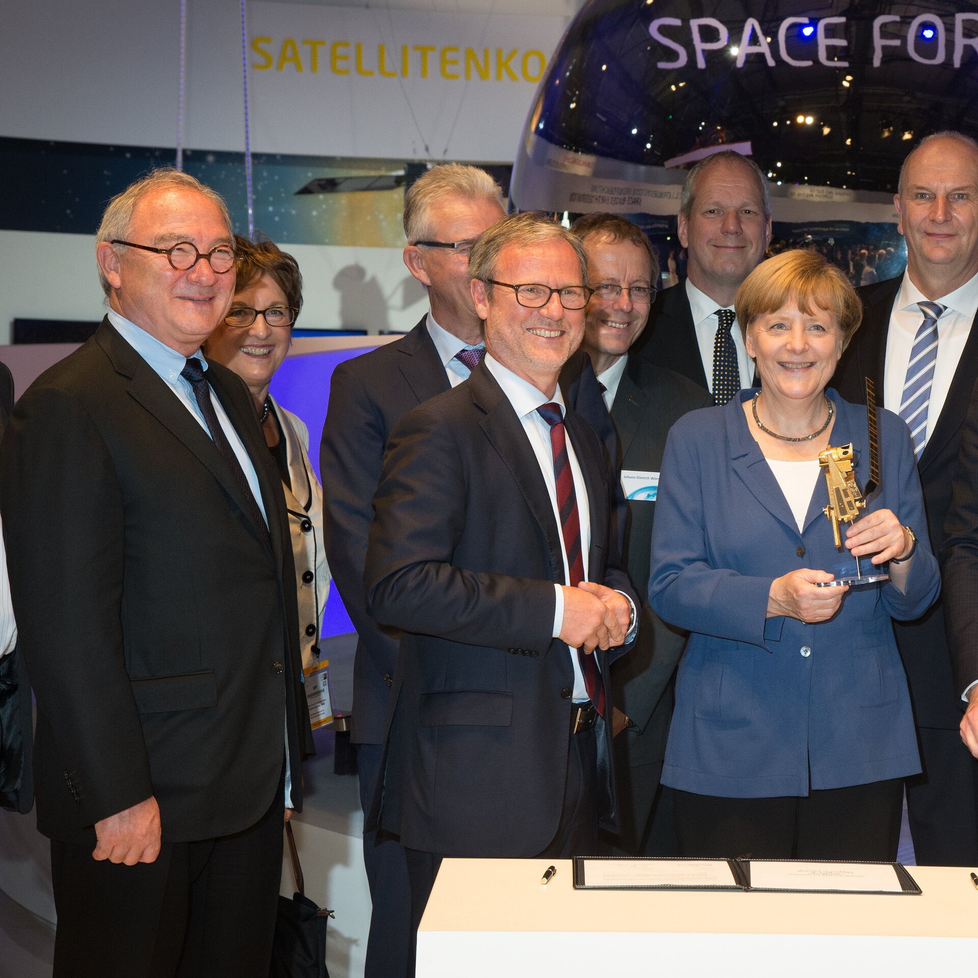 Angela Merkel at the ‘Space for Earth’ space pavilion at ILA