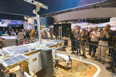 John B. Emerson visits the ‘Space for Earth’ space pavilion at ILA