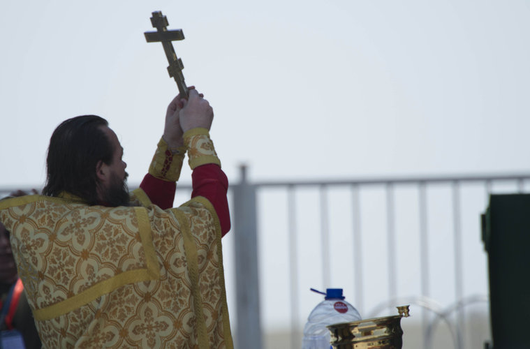 Soyuz TMA-13M spacecraft blessed by a priest ahead of takeoff