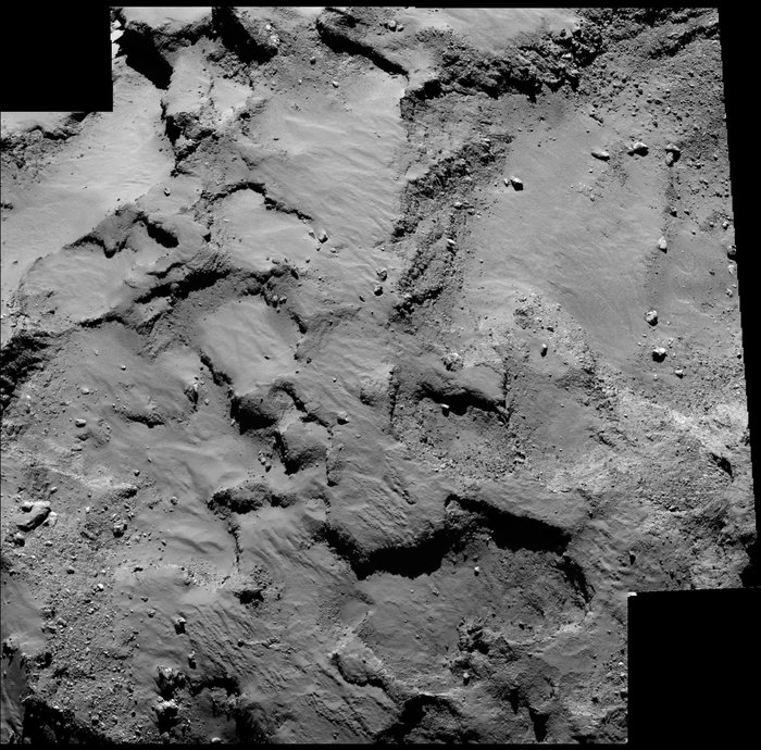 Close-up of the region containing Philae’s primary landing site J, which is located on the ‘head’ of Comet 67P/Churyumov–Gerasimenko. The mosaic comprises two images taken by Rosetta’s OSIRIS narrow-angle camera on 14 September 2014 from a distance of about 30 km. The image scale is 0.5 m/pixel.