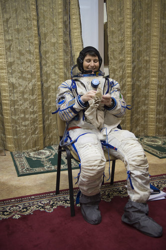 Samantha wearing her Sokol spacesuit 