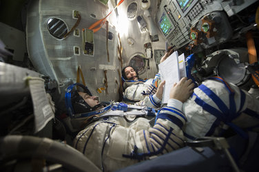 Thomas and Oleg  during training in the Soyuz TMA simulator