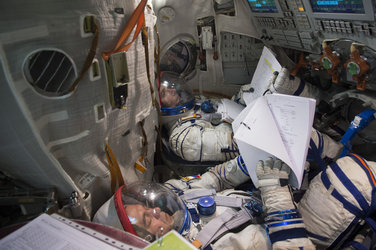 Thomas and Oleg  during training in the Soyuz TMA simulator