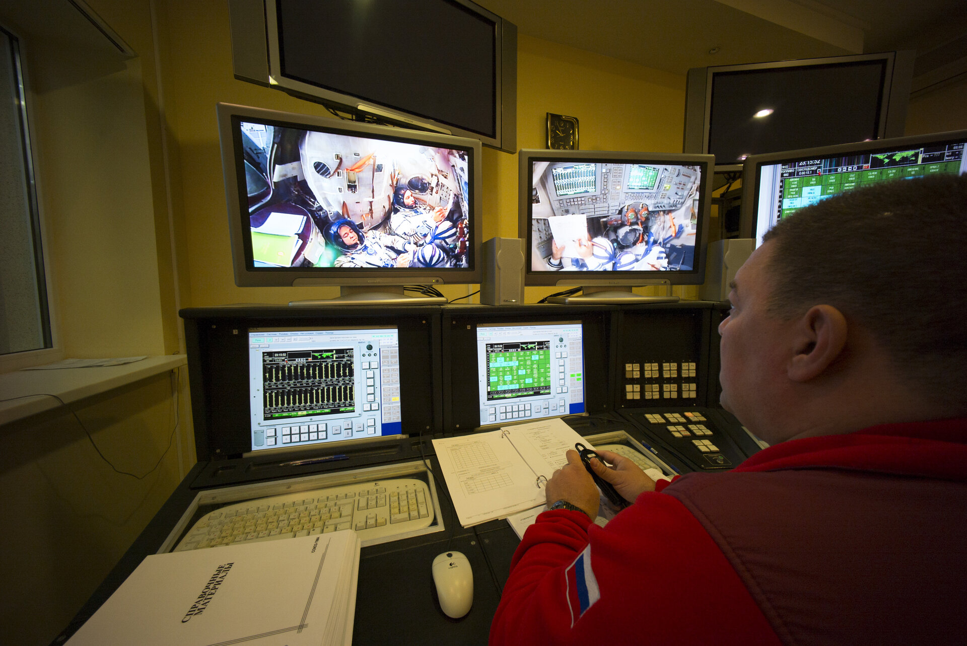 Thomas and Oleg  during training in the Soyuz TMA simulator