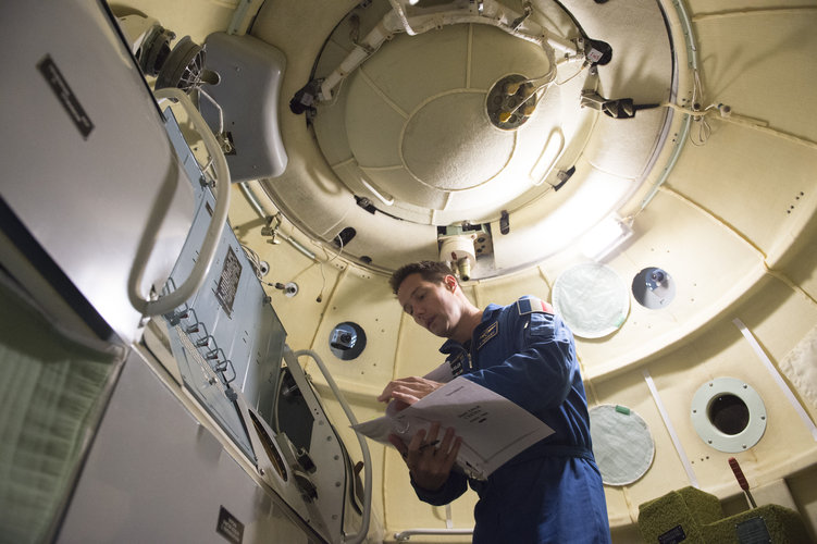 Thomas during training in the Soyuz TMA simulator