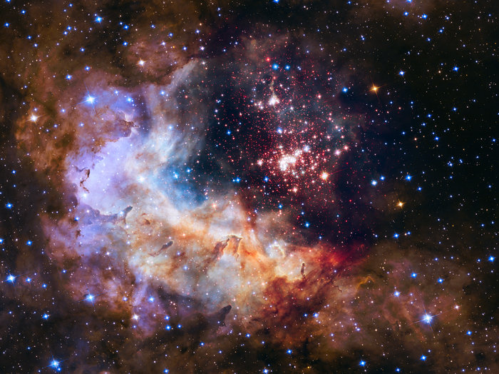 This glittering tapestry of young stars flaring into life in the star cluster Westerlund 2 has been released to celebrate the NASA/ESA Hubble Space Telescope’s 25th year in orbit and a quarter of a century of discoveries, stunning images and outstanding science.