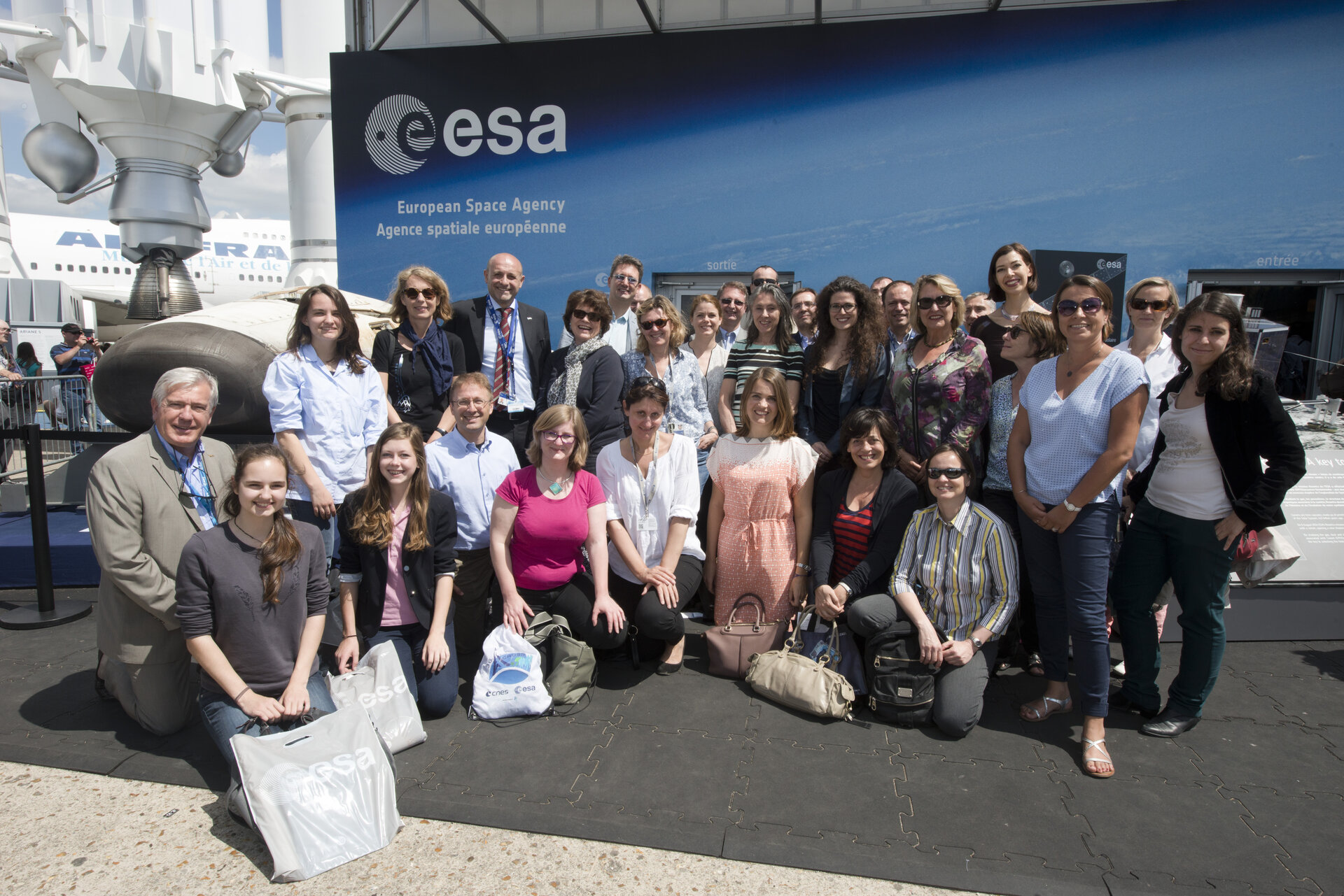 ESA staffs in front of the ESA pavilion