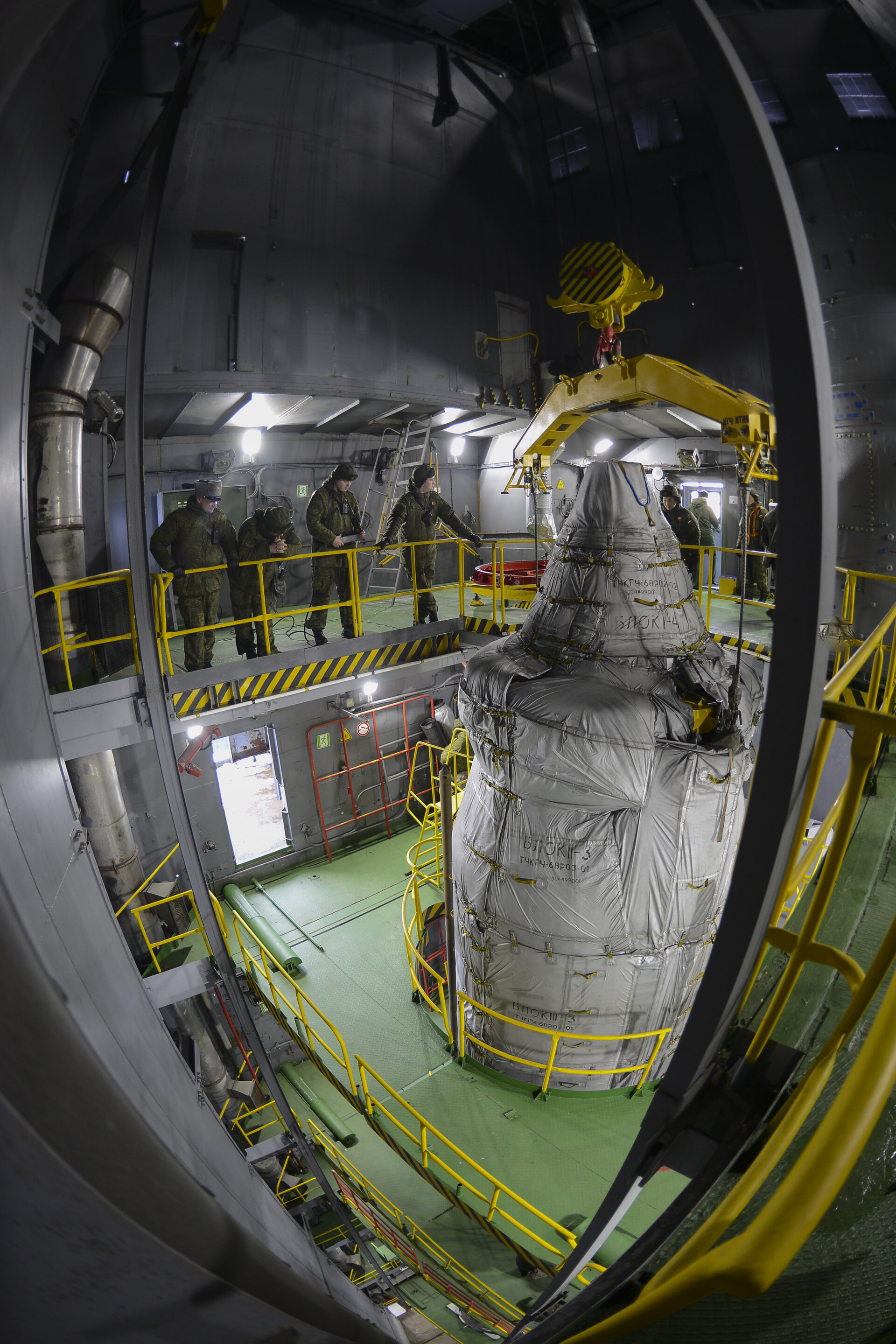 Sentinel-3A upper composite hoisted to the top of the service tower