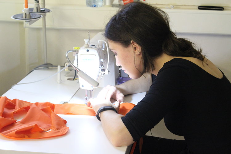 Student working on a garment