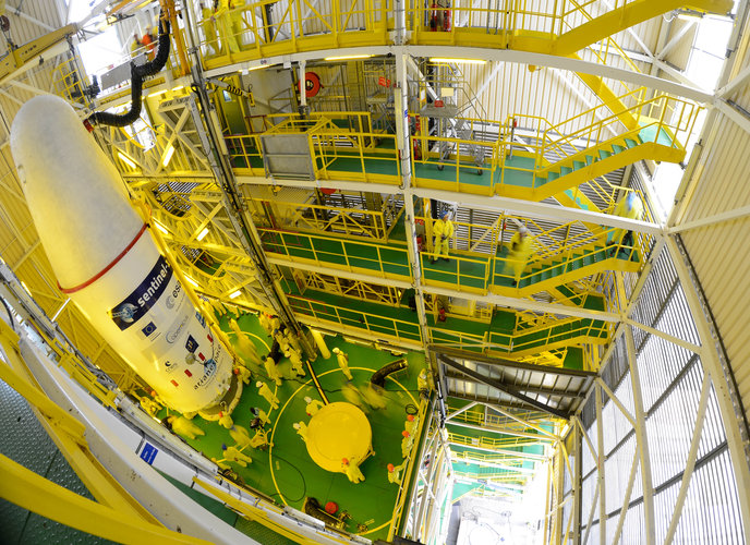 Soyuz VS14 upper composite hoisted to the top of the service tower