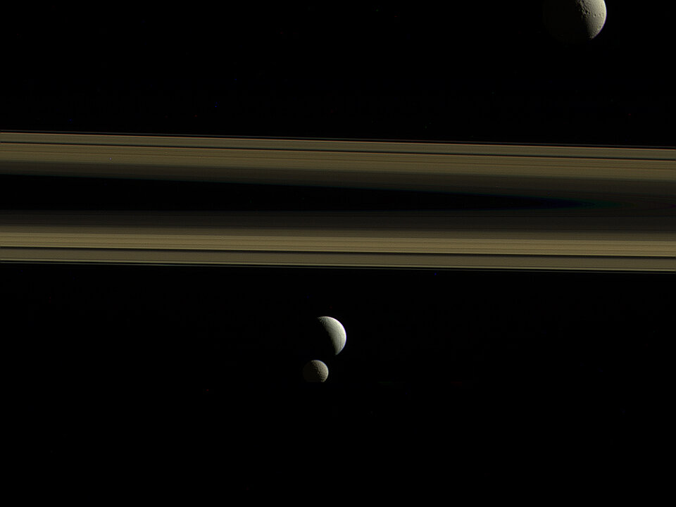 Tethys, Enceladus, Mimas and Saturn's rings.