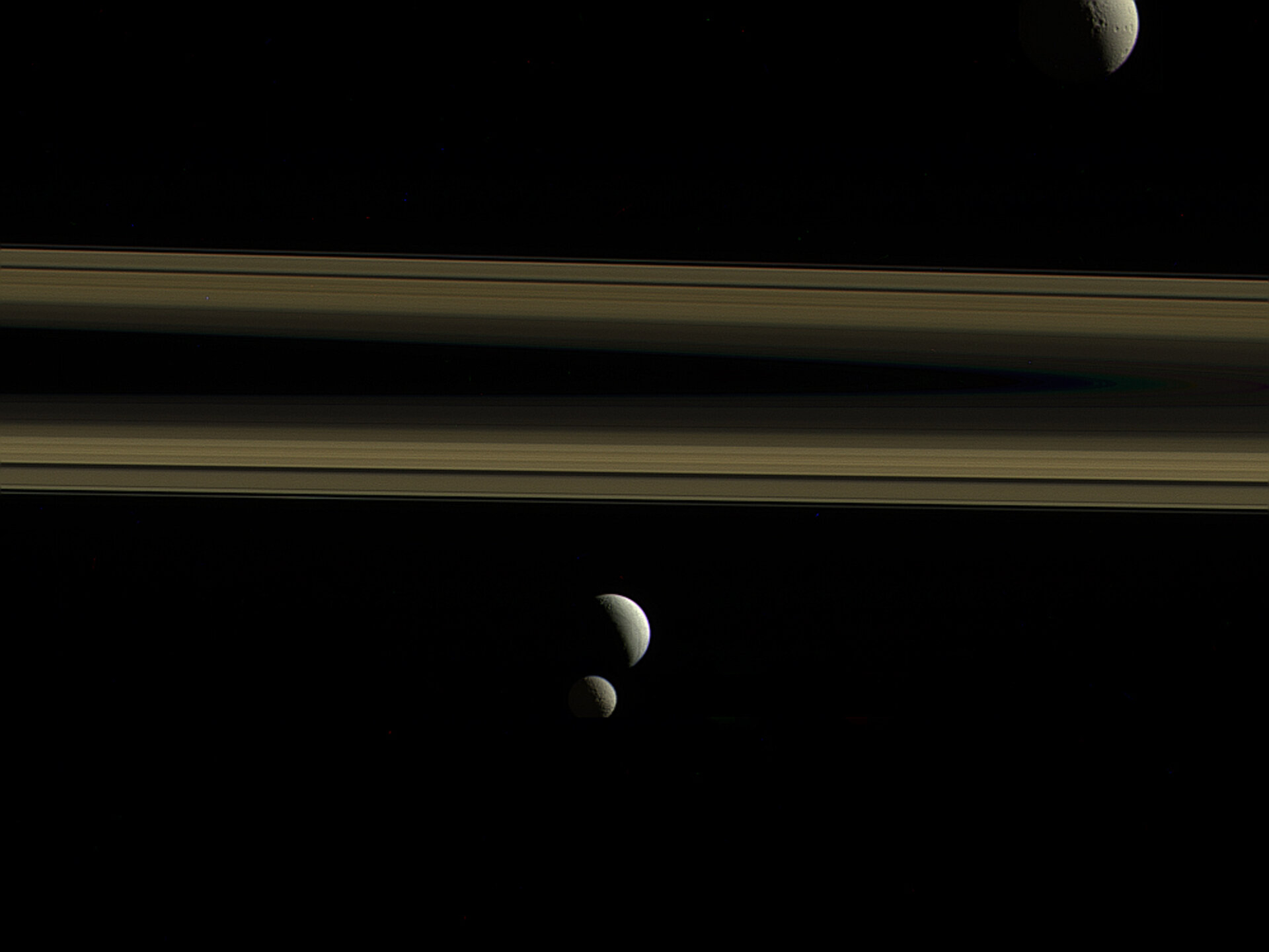 Tethys, Enceladus, Mimas and Saturn's rings.