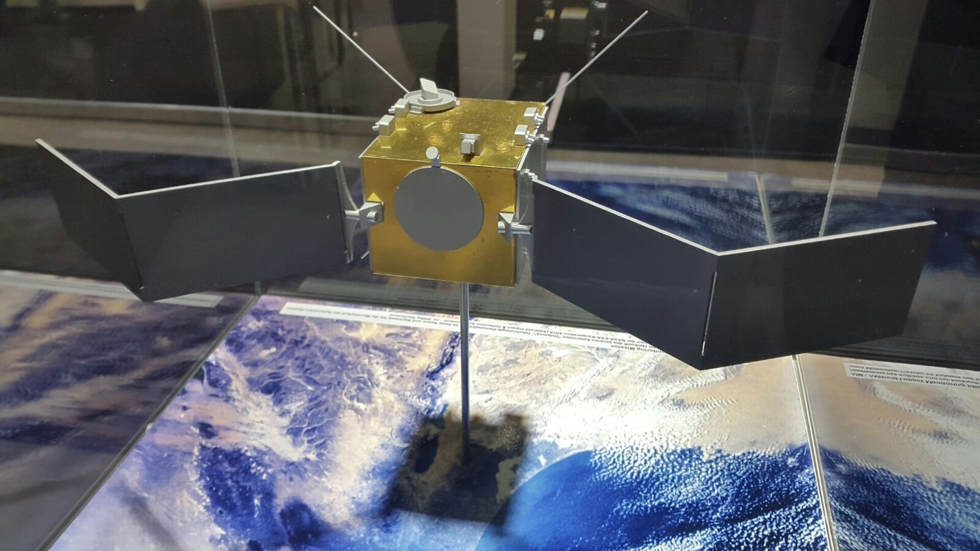 The AIM spacecraft model shown at ILA