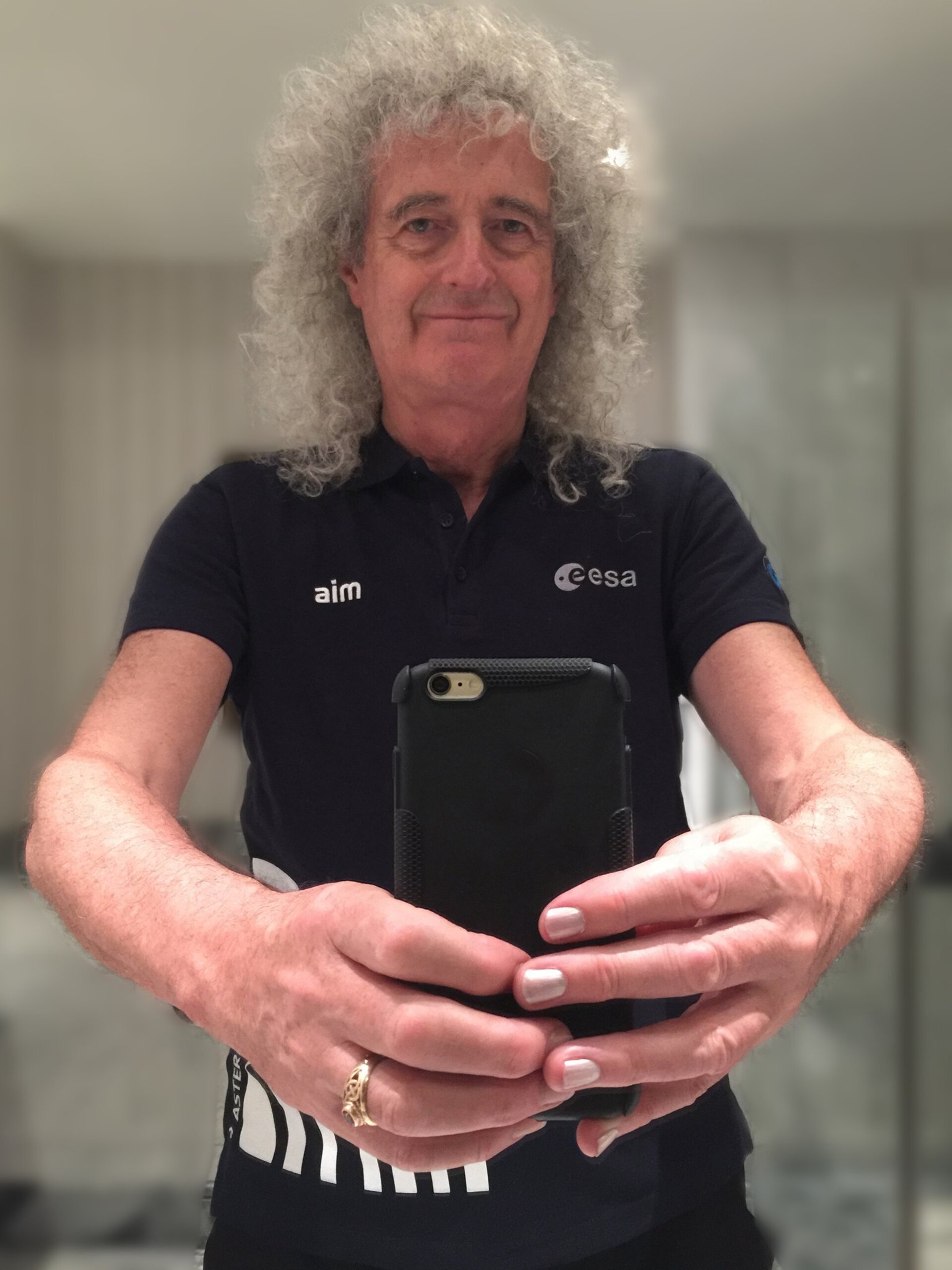 Brian May in ESA AIM shirt
