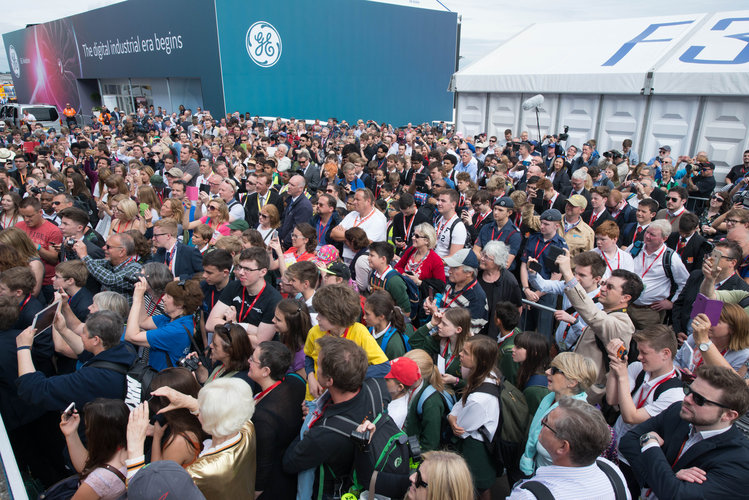 Crowds gather to listen to ESA astronaut Tim Peake speak from the balcony