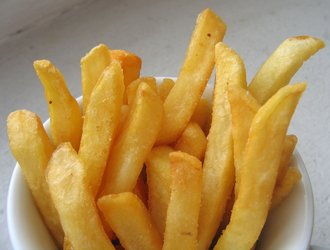 French fries being deep fried