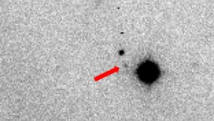 CFHT 2003 precovery image of 2016 WJ1: the asteroid appears a faint spot between two bright stars
