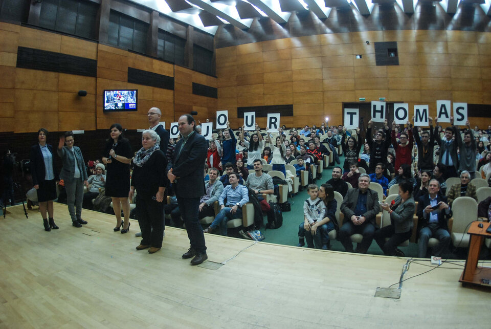 Romanian teachers and students saluting Thomas Pesquet in his native French