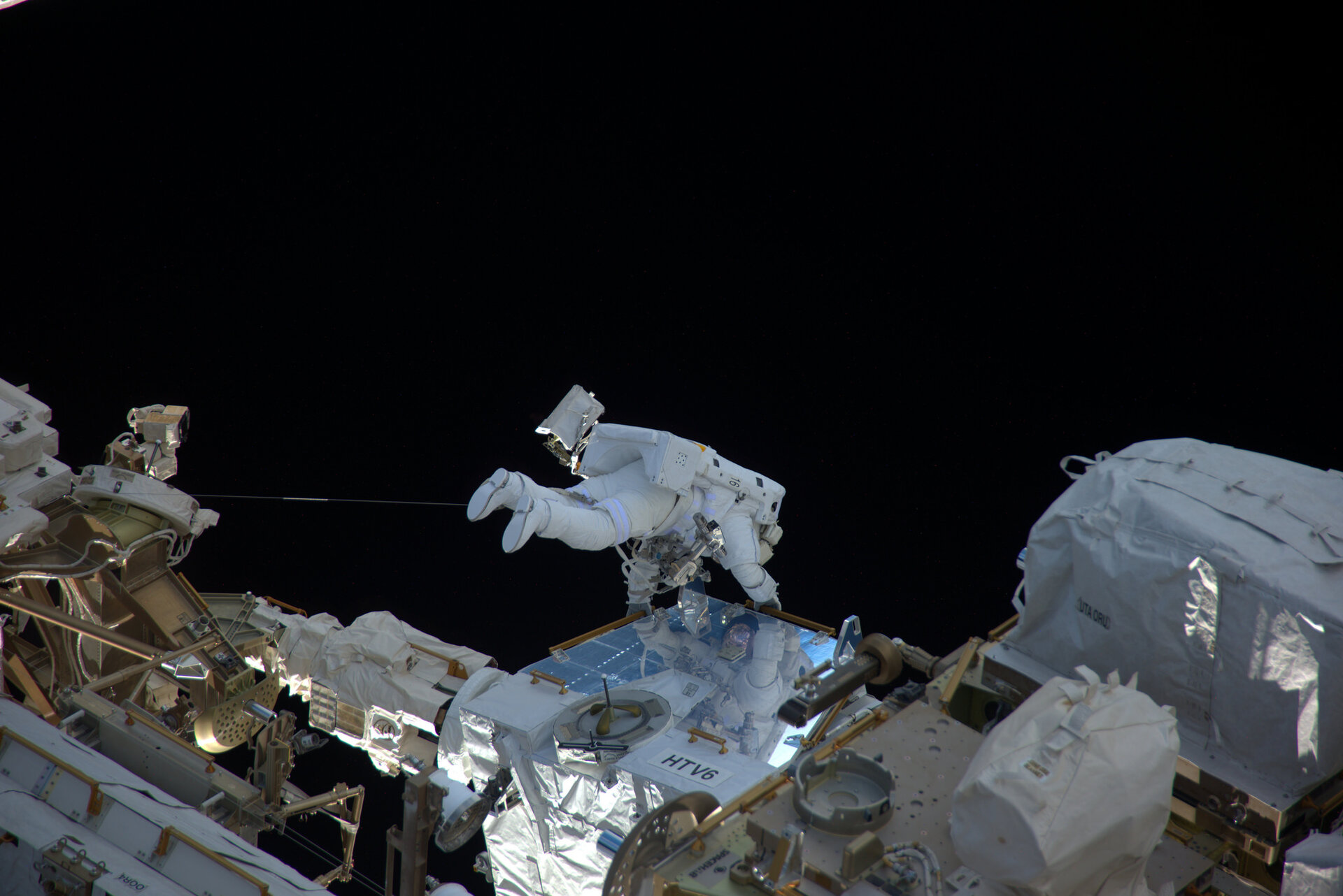 Thomas completing a spacewalk during his mission