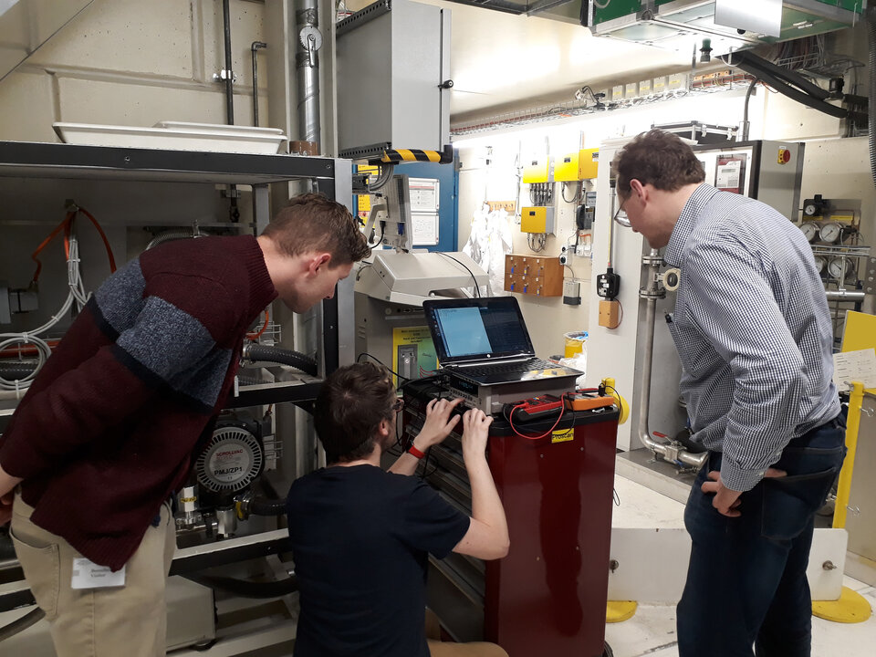 Team EIRSAT-1 performing additional checks before proton radiation test