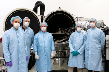 LaRa team beside thermal vacuum chamber