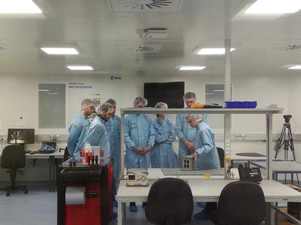 Students visiting the CubeSat Support Facility during the Workshop