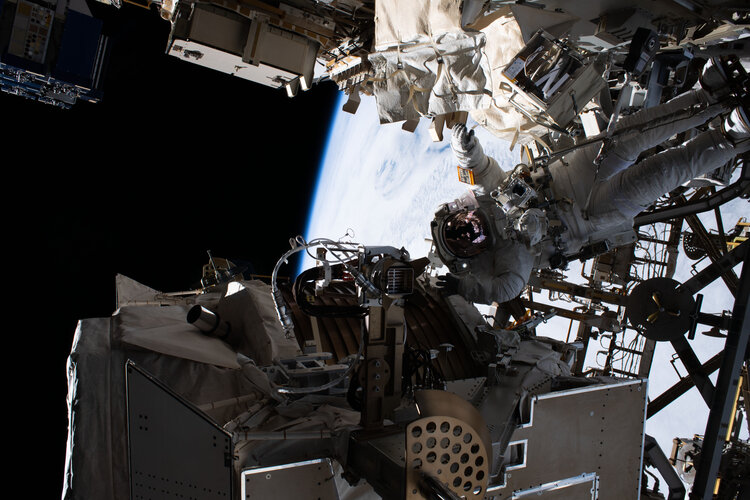 Drew working on AMS-02 during second servicing spacewalk