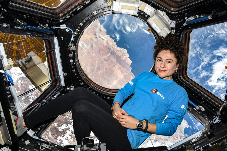 NASA astronaut Jessica Meir rocking her Caves shirt aboard the International Space Station 