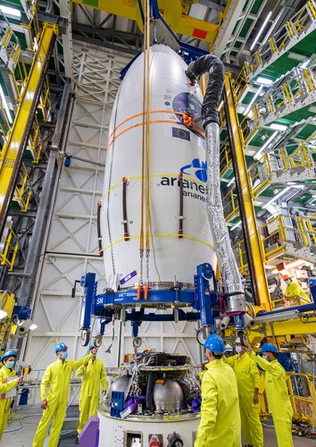 Multiple light satellites secured on the SSMS dispenser inside the fairing are mounted on Vega inside the mobile gantry at Europe's Spaceport ahead of flight VV16.