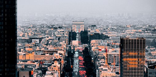 Urban traffic around the Arc de Triomphe in Paris