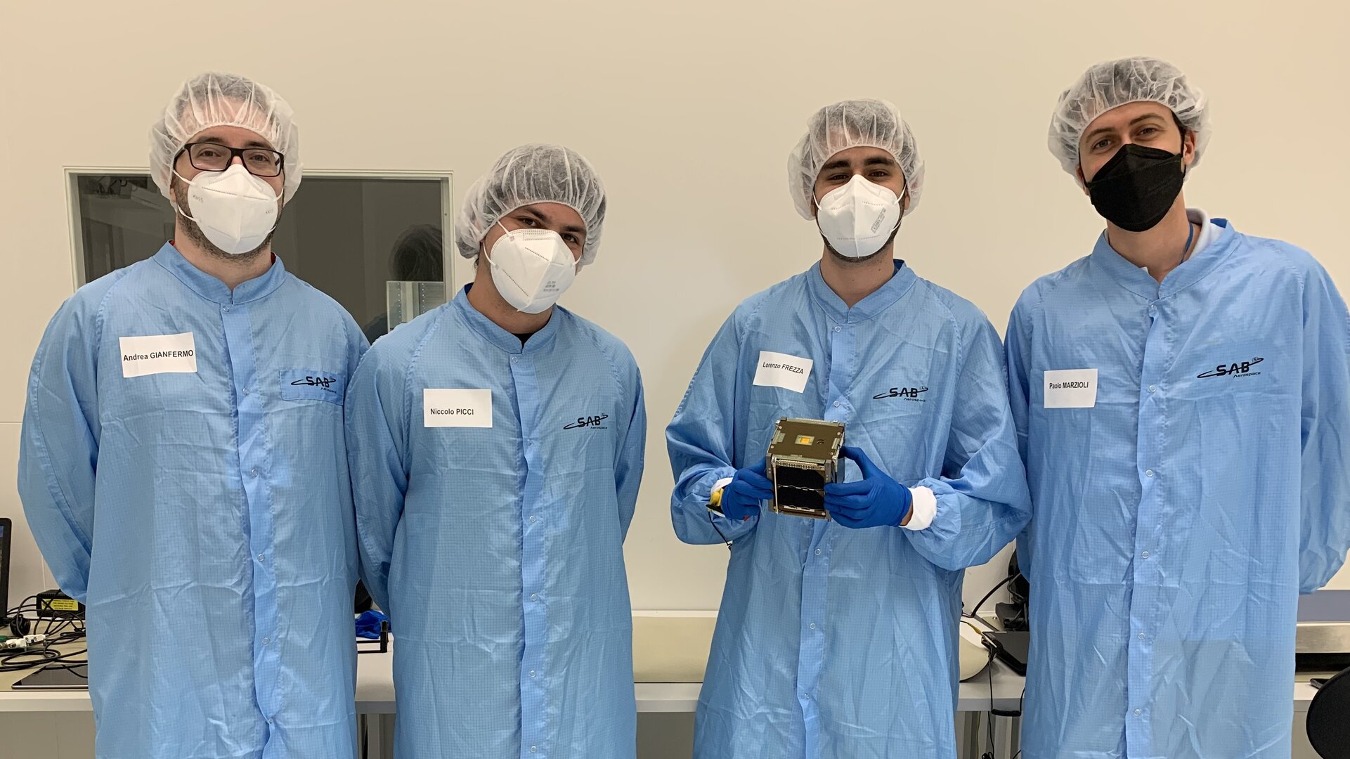 Members of the LEDSAT team in the cleanroom, ready to integrate!