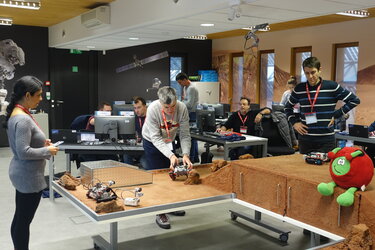 Secondary School Teachers exploring the surface of planet Mars with their experimental rovers.