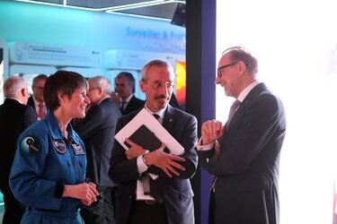 ESA astronaut Samantha Cristoforetti and Teodoro Valente, President of ASI, visit ESA's exhibition with ESA Director General Josef Aschbacher.
