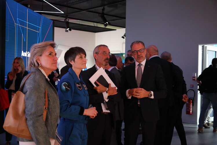 ESA astronaut Samantha Cristoforetti and Teodoro Valente, President of ASI, visit ESA's exhibition with ESA Director General Josef Aschbacher.