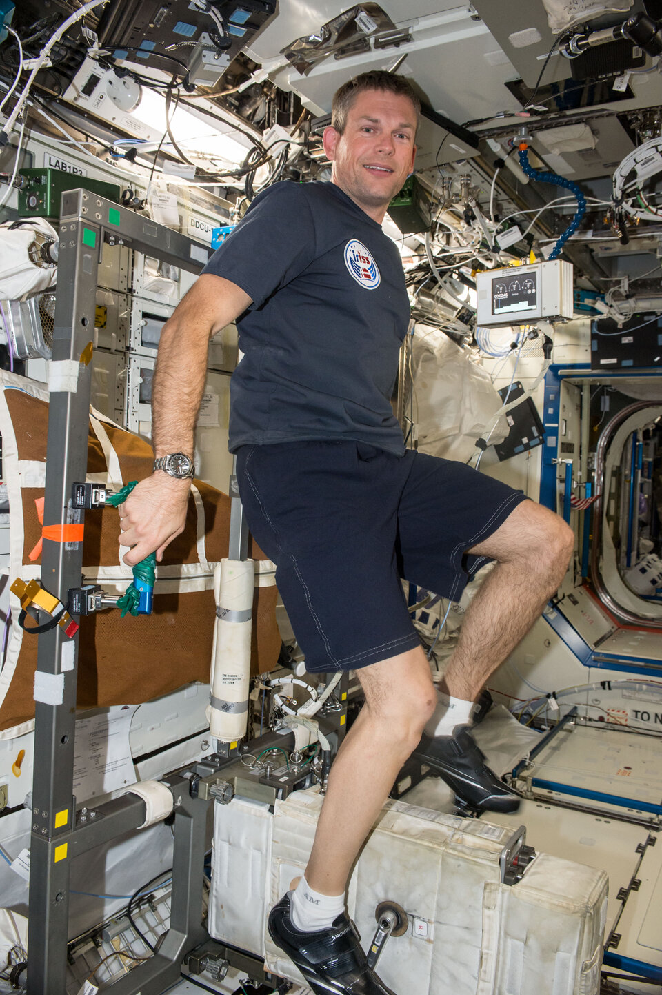 Andreas Mogensen exercising on the old CEVIS bike during his iriss mission in 2015