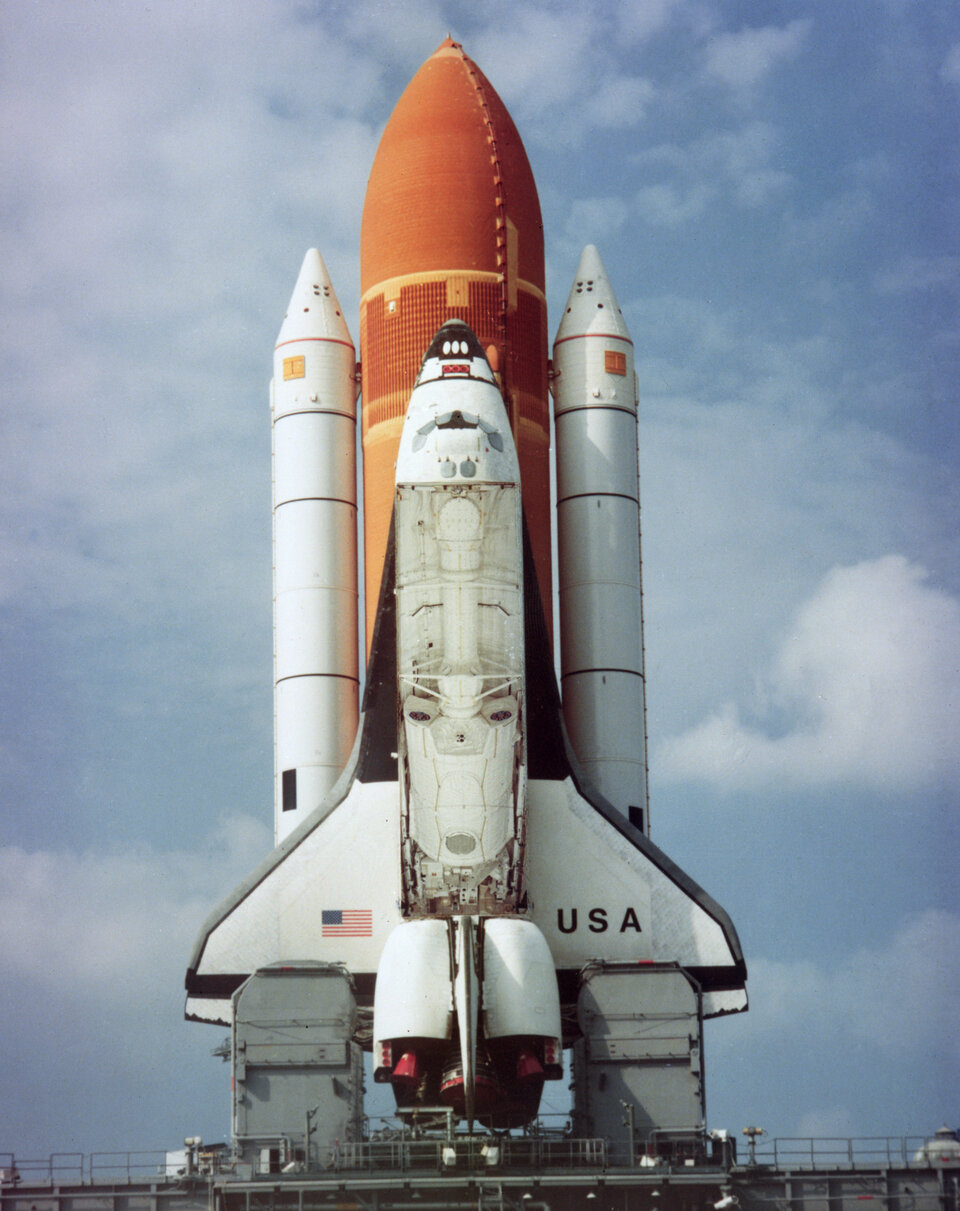 Composite photo overlaying Spacelab inside the Shuttle cargo bay