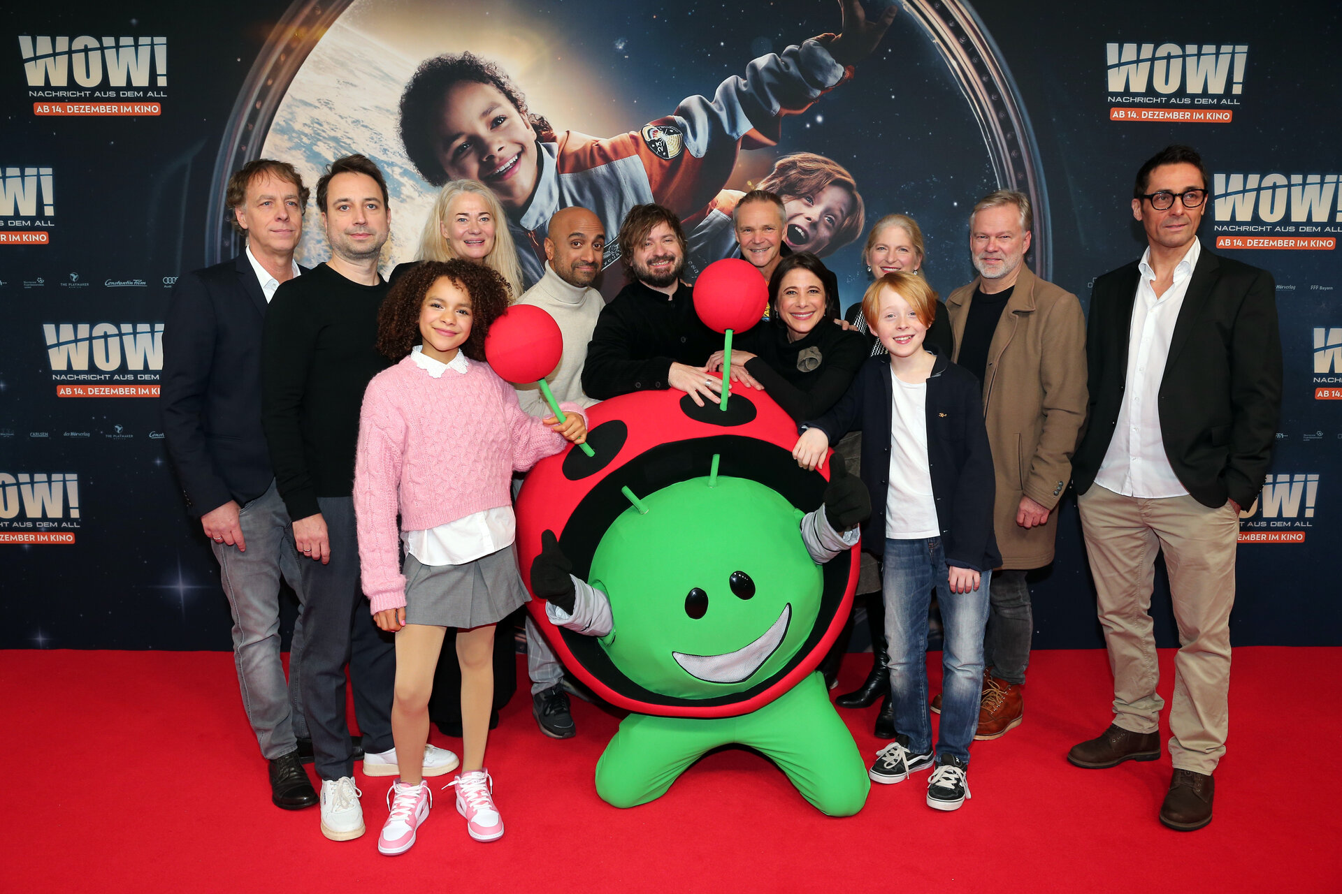 ESA's mascot Paxi at the movie premiere of Wow! Message from Outer Space.