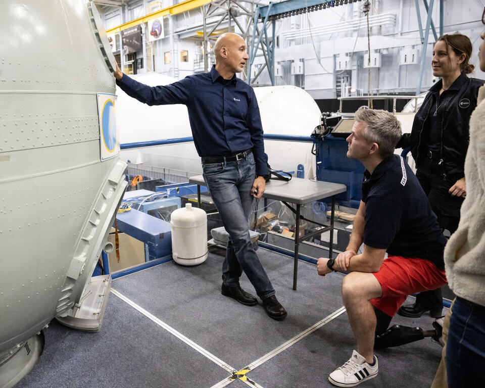 ESA astronaut Luca Parmitano leading a tour for ESA astronaut candidates visiting NASA's Johnson Space Centre