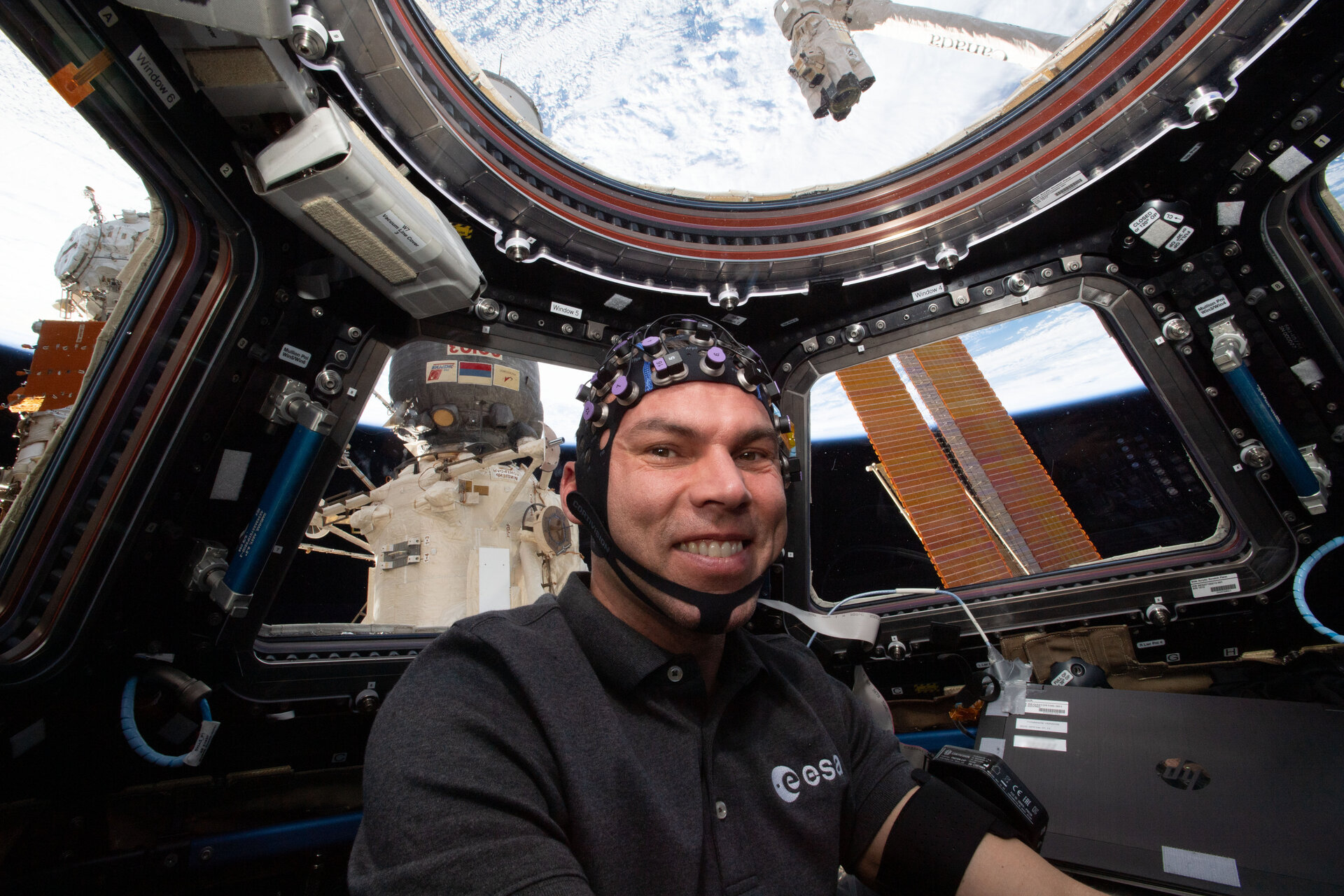 ESA project astronaut Marcus Wandt wears a cap with sensors to record his brain activity