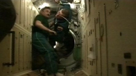 Astronauts entering the ISS
