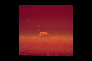 Saturn viewed through Titan's hazy atmosphere