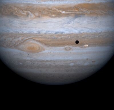 Moon Io in front of Jupiter
