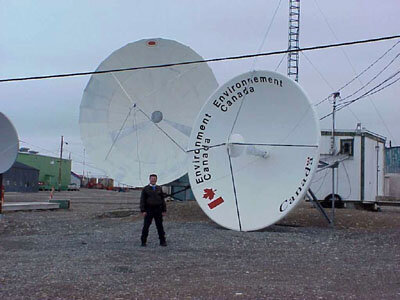 Vladmir Pletser in front of antennas