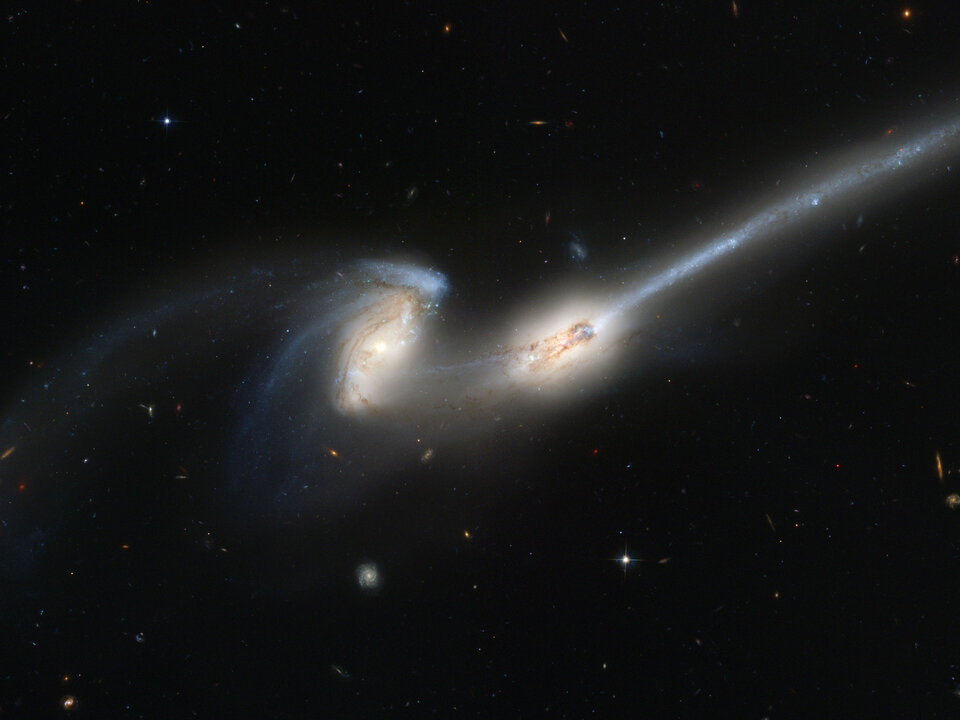 Hubble's newest camera takes a deep look at two merging galaxies